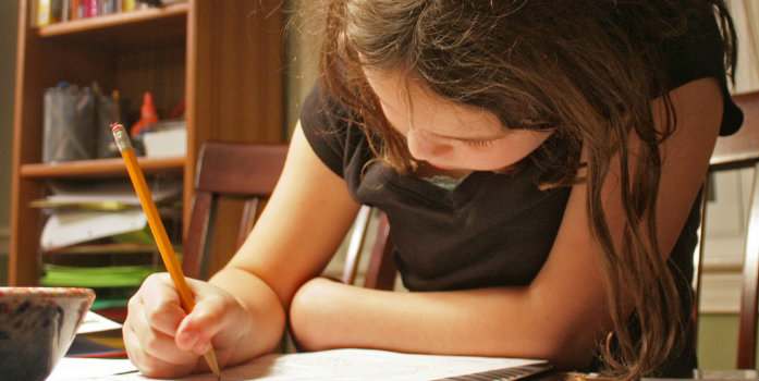 little girl writing letter